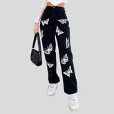 Schwarze Damenjeans mit Schmetterlingen